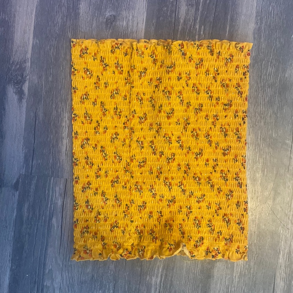 tub top. Size XS yellow with flowers. stretchy and very fitted.